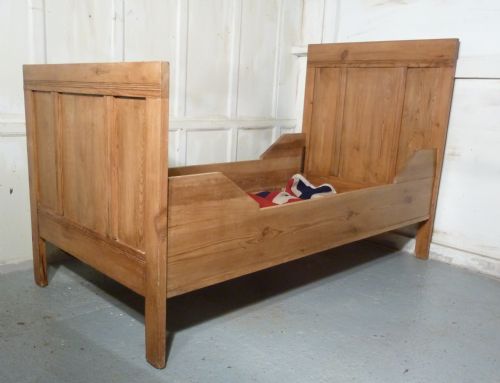 A 19th Century French Rustic Pine Single Sleigh Bed