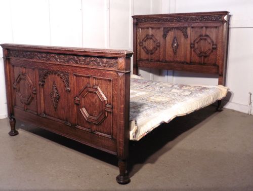 A Superb Victorian Gothic Carved Oak Double Bed