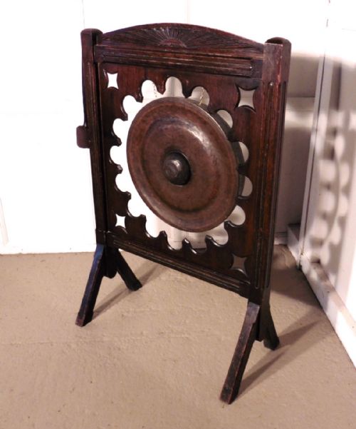 A Large Art Deco Mahogany and Brass Dinner Gong