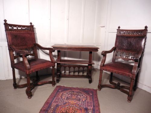 fig 3. A pair of French Gothic Walnut and Leather Library Chairs