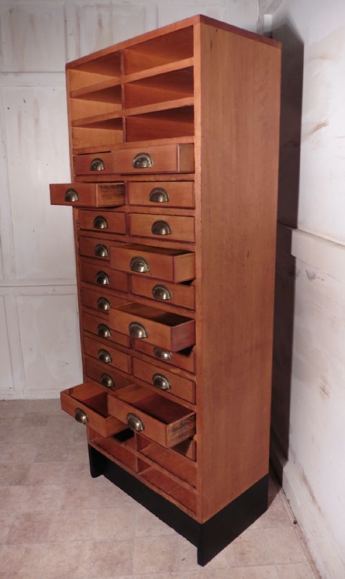 fig 3. A Tall Art Deco Oak Filing Cabinet, Haberdashers Shelves