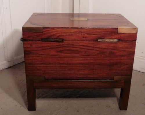 fig 1. A 19th Century Mahogany Campaign Chest, Necessaire and Coffee Table