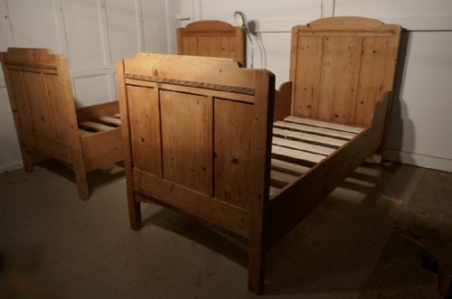 A Pair of 19th Century French Rustic Pine Single Sleigh Beds