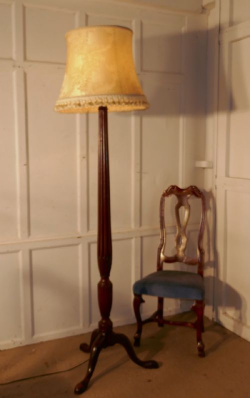 A Mahogany Floor Standing Lamp