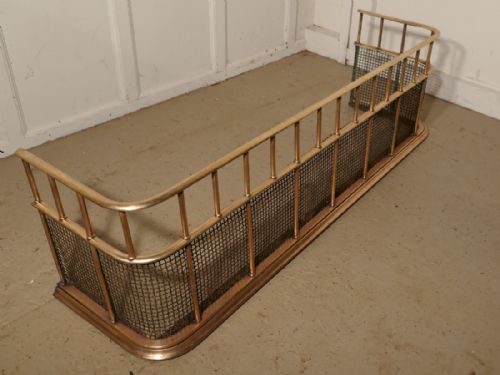 A Large Victorian Brass Club Fender