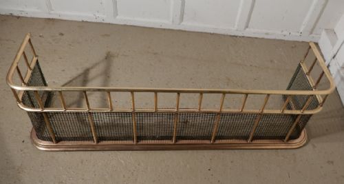 fig 3. A Large Victorian Brass Club Fender