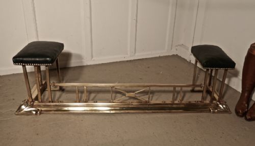 An Art Nouveau Brass and Leather Club Fender