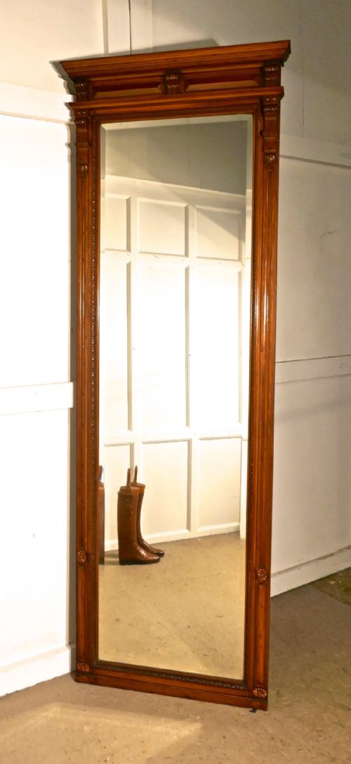 A Tall French Carved Walnut Wall Mirror, Pier Mirror