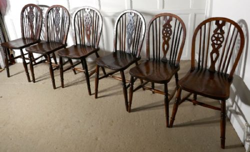 A Harlequin Set of 6 Victorian Beech & Elm Wheel Back Windsor Kitchen Dining Chairs