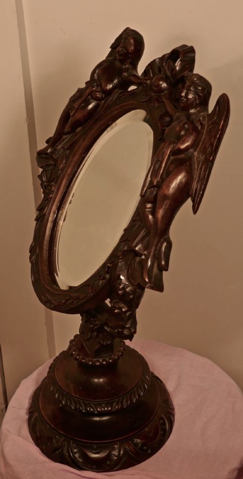 fig 2. A 19th Century Gothic Walnut Vanity Mirror, Carved with Angels