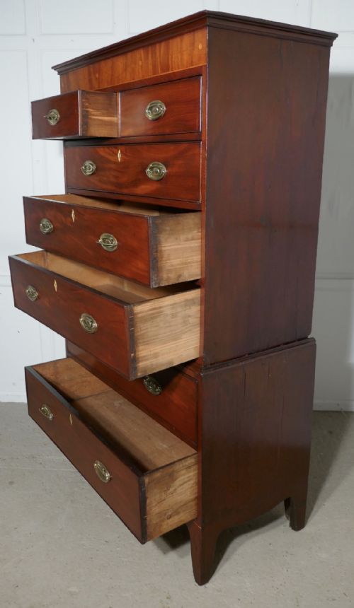 fig 3. A Georgian Flame Mahogany Chest on Chest, with Inlay to the Cornice