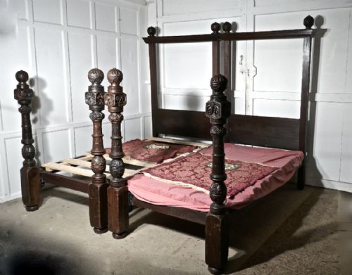 A Pair of Gothic Carved Oak 4 Poster Beds