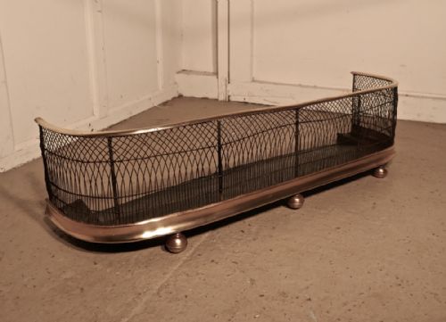 A Georgian Brass and Iron Club Fender or Nursery Fire Guard