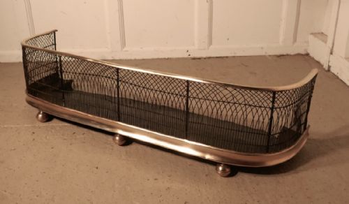 fig 1. A Georgian Brass and Iron Club Fender or Nursery Fire Guard
