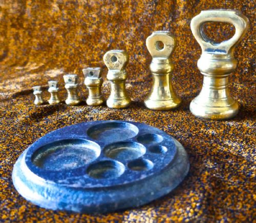 fig 1. Set of Seven Kitchen Brass Bell Weights on Stand