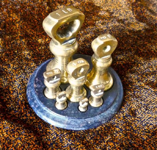 fig 2. Set of Seven Kitchen Brass Bell Weights on Stand