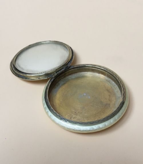 fig 1. Sterling Silver Guilloche Enamel Compact Case, with a Garland of Flowers