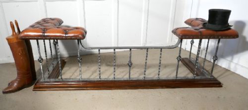 A Large Polished Steel and Leather Club Fender