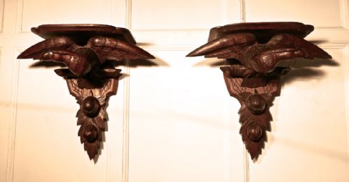 A 19th Century Pair of Carved Oak Wall Brackets, Eagles