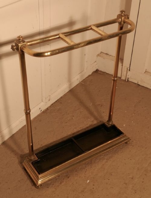 A Victorian Brass and Cast Iron Walking Stick Stand or Umbrella Stand