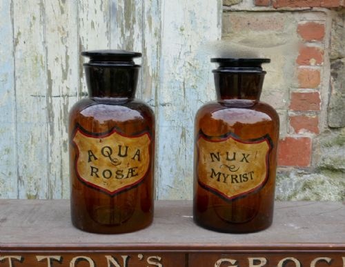 A Pair of Amber Glass Chemist Jars, Large Stoppers