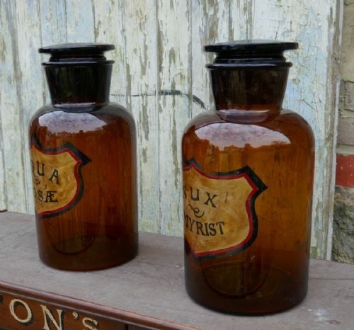 fig 3. A Pair of Amber Glass Chemist Jars, Large Stoppers
