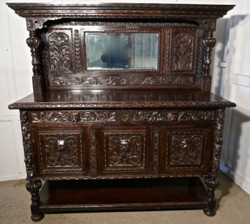 19th Century Carved Oak Mirror Back Dresser with Tree of Life and Green Man Carvings