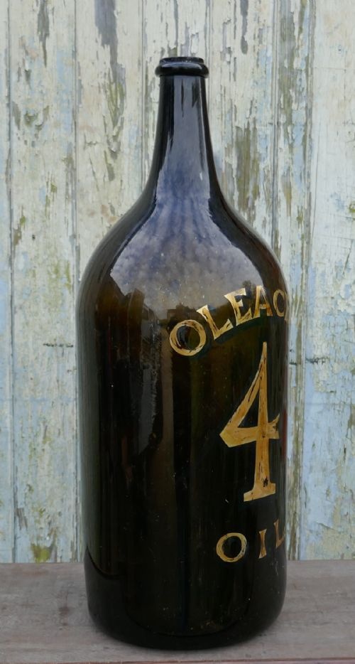 fig 3. Giant 19th Century Italian Olive Oil Bottle with Gold Number and Lable