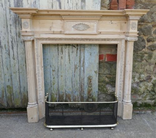 A Large Victorian Adams Style Stripped Pine Fireplace.