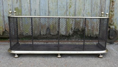 A Victorian Brass and Iron Club Fender