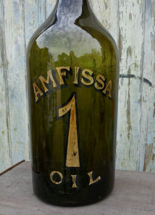 fig 1. Giant 19th Century Greek Olive Oil Bottle with Gold Number and Lable
