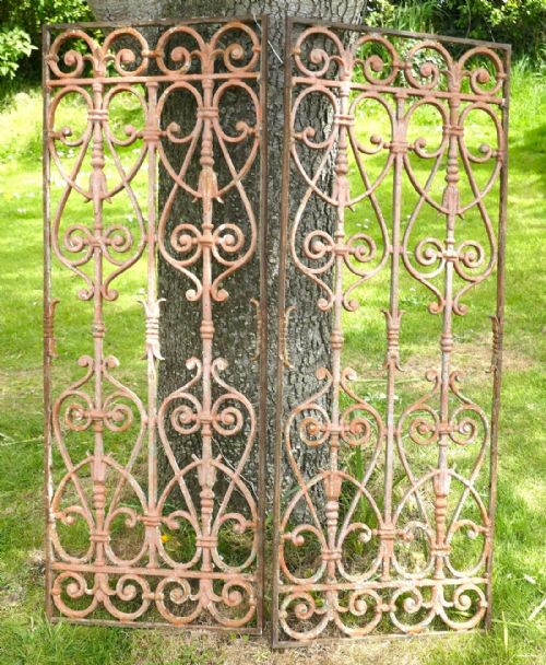 A Pair of Large French Cast Iron Arts and Crafts Door Panels