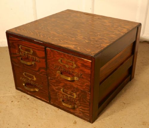 fig 4. Filing Cabinet, Chemist Drawers with Gold Lettering