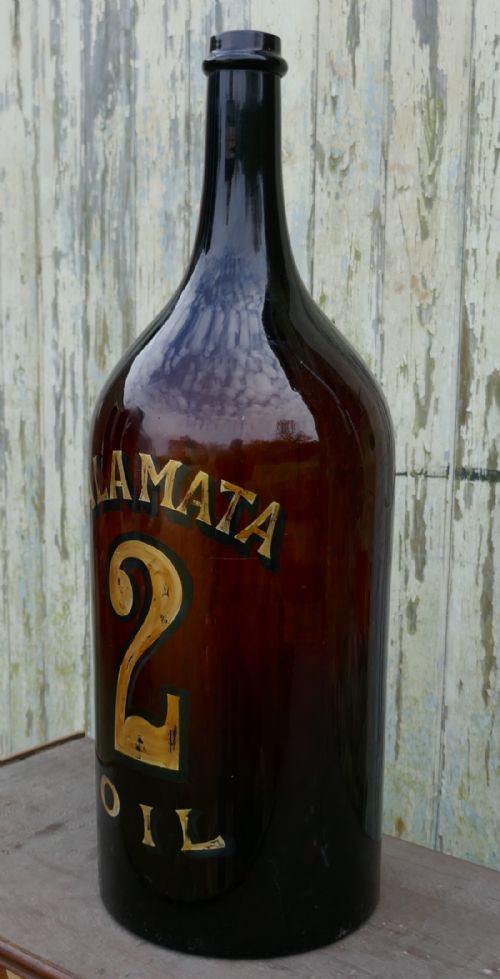 fig 2. Giant 19th Century Greek Olive Oil Bottle with Gold Number and Lable