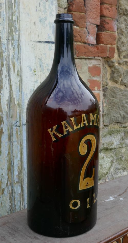 fig 3. Giant 19th Century Greek Olive Oil Bottle with Gold Number and Lable