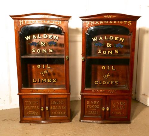 A Pair of Victorian Mahogany Sign Painted Chemist’s or Bathroom Cupboards