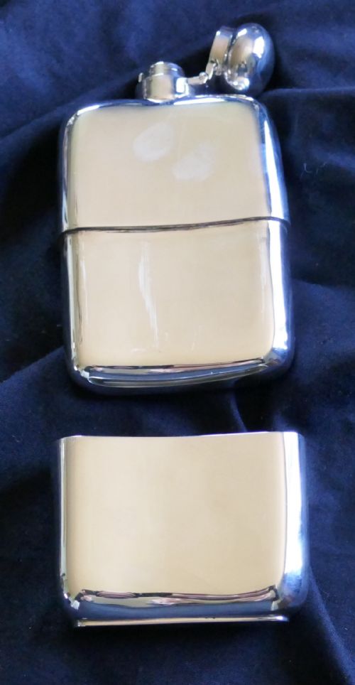 fig 4. A Solid Silver Hall Marked Hip Flask and Cup. Date 1935