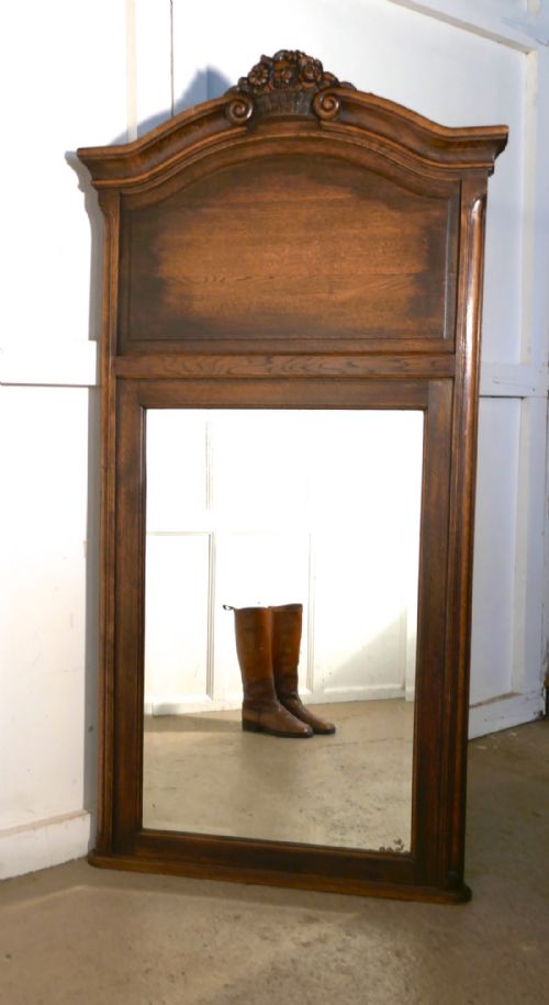 A Very Large French Carved Oak Wall Mirror