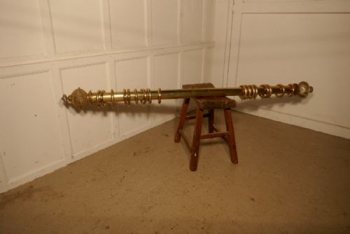 A Very Chunky Victorian Brass Curtain Poles with Rings