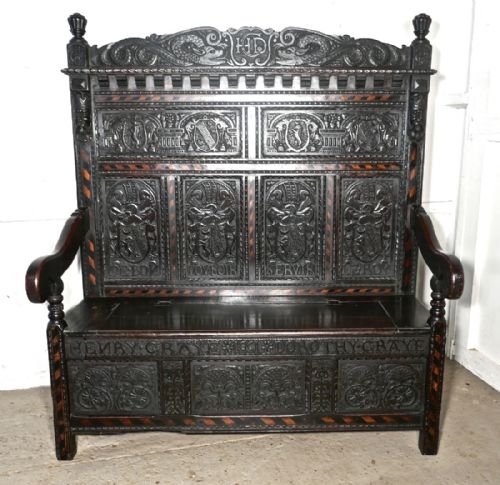 An 17th Century High Back Inlaid Oak Marriage Settle