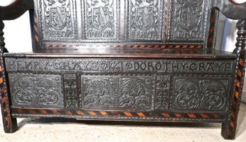 fig 2. An 17th Century High Back Inlaid Oak Marriage Settle