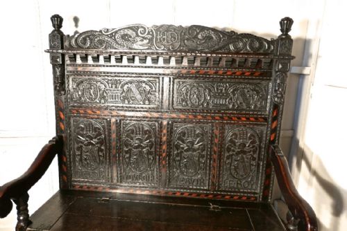 fig 3. An 17th Century High Back Inlaid Oak Marriage Settle
