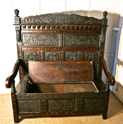 fig 5. An 17th Century High Back Inlaid Oak Marriage Settle