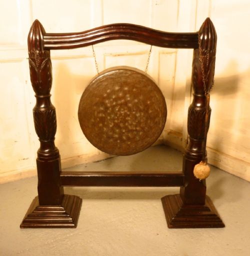 A Large Carved Mahogany & Brass Dinner Gong