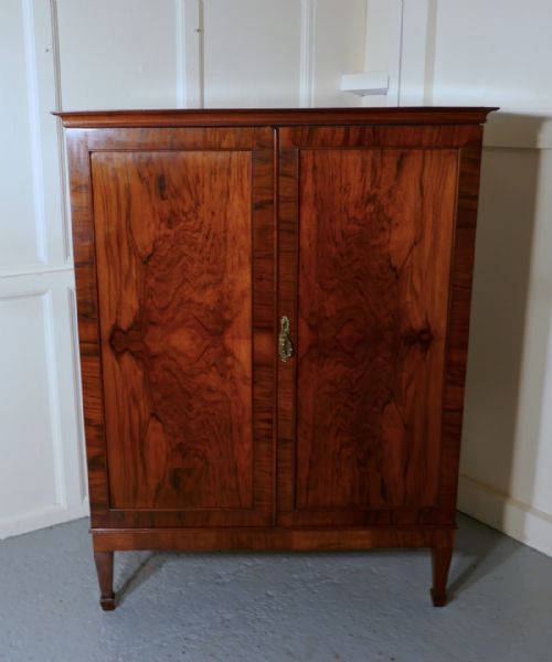fig 2. Art Deco Figured Walnut Cupboard.