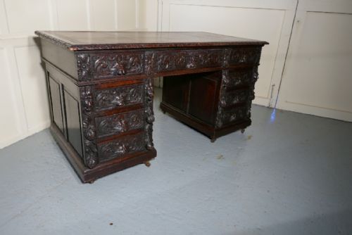 A Superb Large Victorian Green Man Carved Oak Pedestal Desk