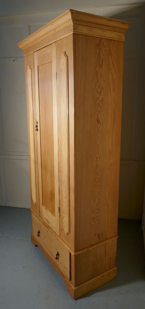 A Victorian Stripped Pine Wardrobe