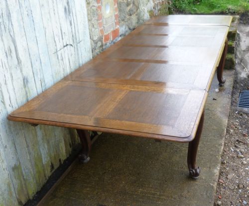 fig 1. A Large French Oak Draw Leaf Table