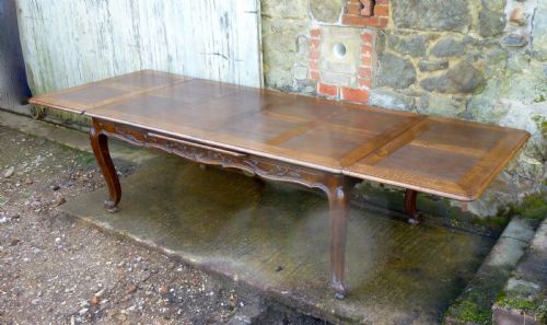 fig 2. A Large French Oak Draw Leaf Table
