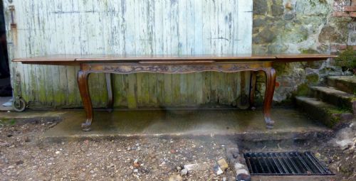 fig 4. A Large French Oak Draw Leaf Table